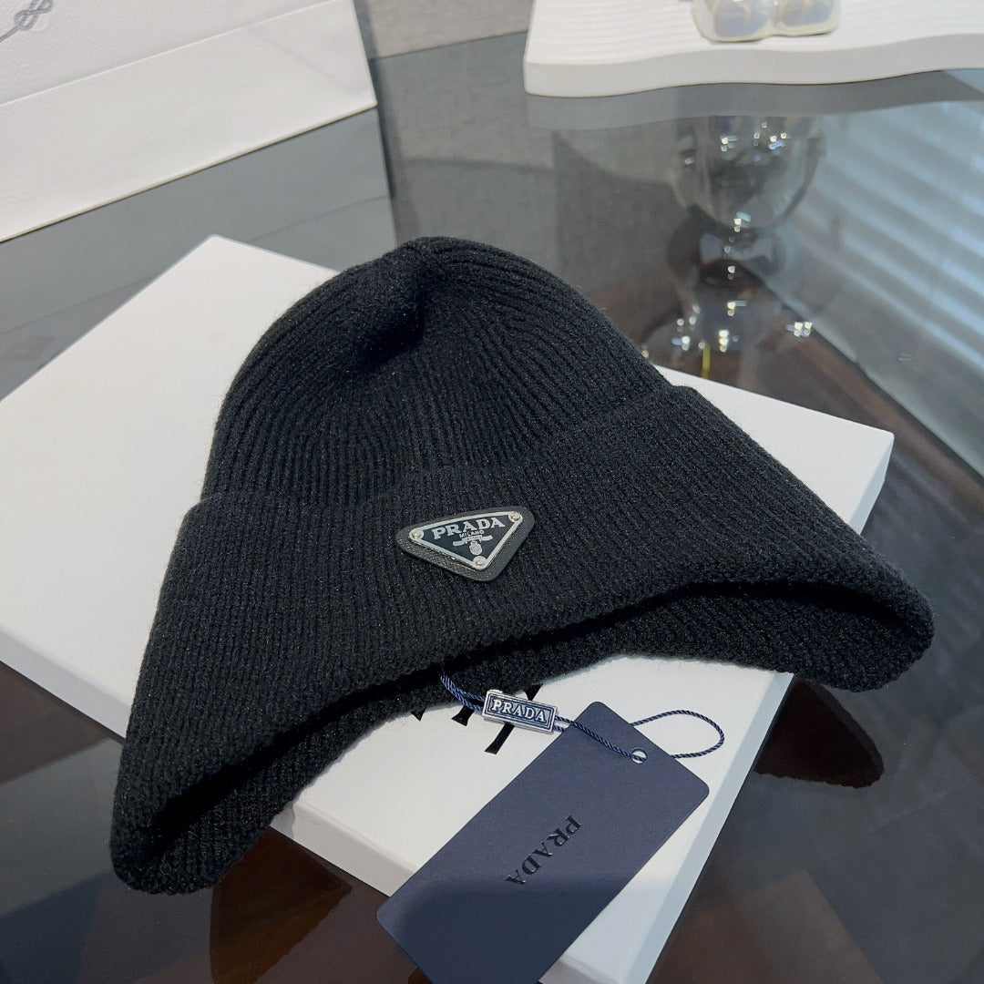 New autumn and winter versatile fashion triangle logo ear protection women's style with plush warm knitted yarn hat