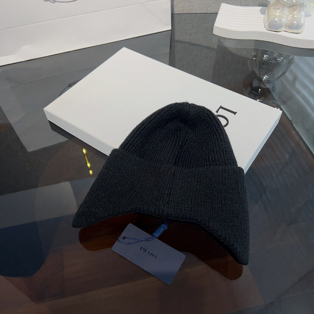 New autumn and winter versatile fashion triangle logo ear protection women's style with plush warm knitted yarn hat