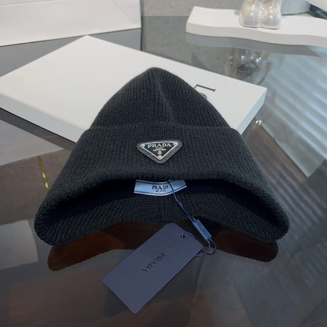 New autumn and winter versatile fashion triangle logo ear protection women's style with plush warm knitted yarn hat