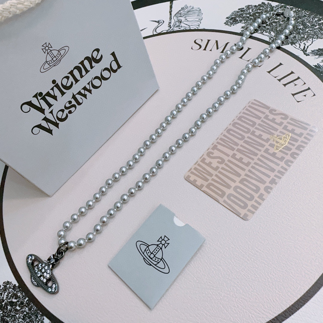 New Fashion Trends  Queen of Saturn 🪐✨  High quality classic Saturn pearl necklace, suitable for both men and women
