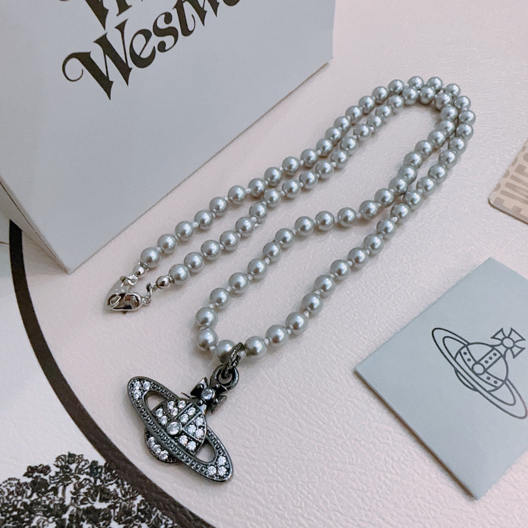 New Fashion Trends  Queen of Saturn 🪐✨  High quality classic Saturn pearl necklace, suitable for both men and women