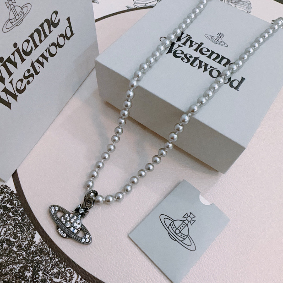 New Fashion Trends  Queen of Saturn 🪐✨  High quality classic Saturn pearl necklace, suitable for both men and women