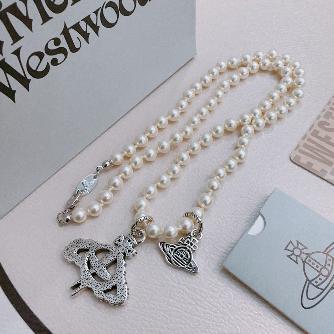 New Fashion Trends  Queen of Saturn 🪐✨  High quality classic Saturn pearl necklace, suitable for both men and women
