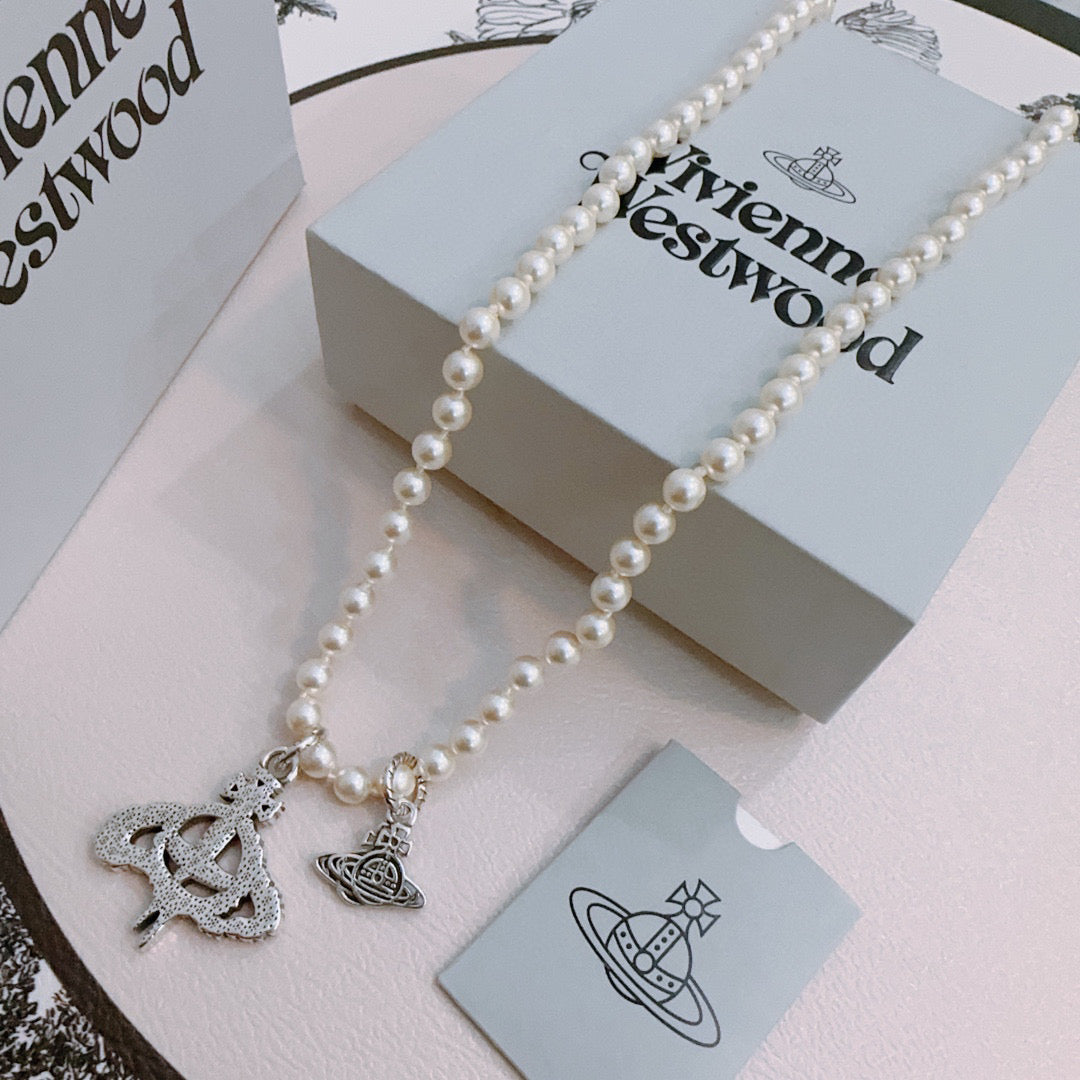New Fashion Trends  Queen of Saturn 🪐✨  High quality classic Saturn pearl necklace, suitable for both men and women