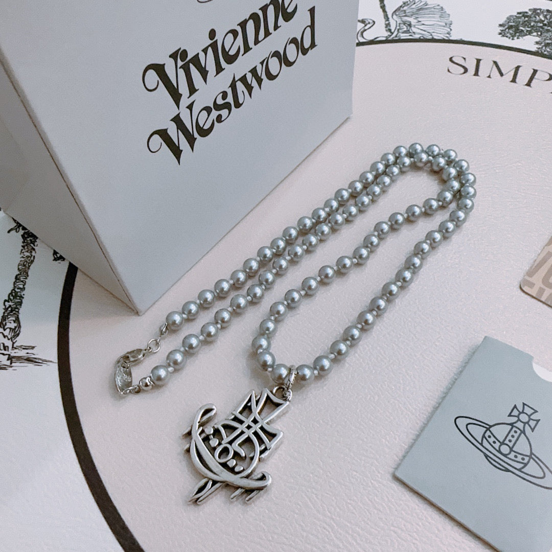 New Fashion Trends  Queen of Saturn 🪐✨  High quality classic Saturn pearl necklace, suitable for both men and women