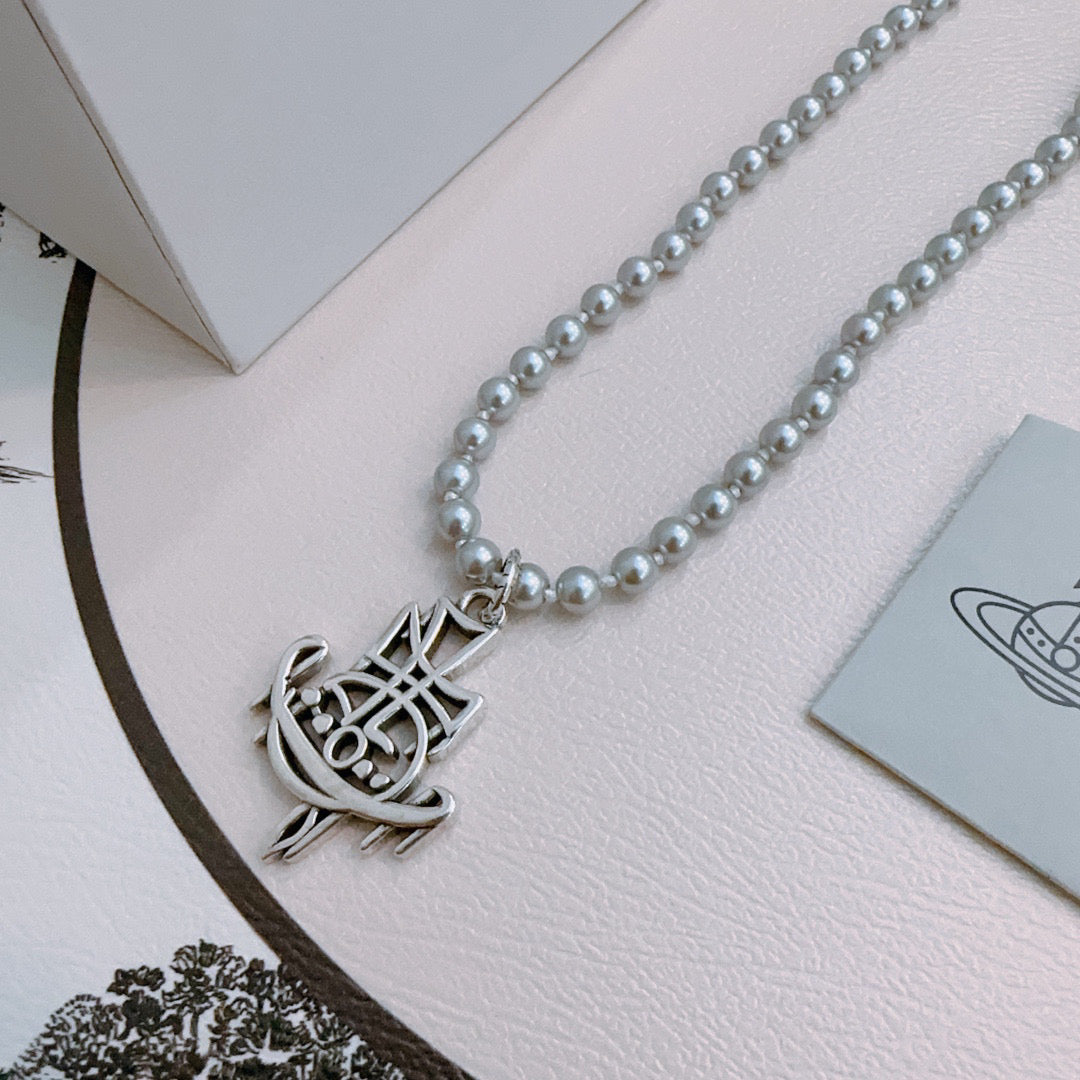 New Fashion Trends  Queen of Saturn 🪐✨  High quality classic Saturn pearl necklace, suitable for both men and women