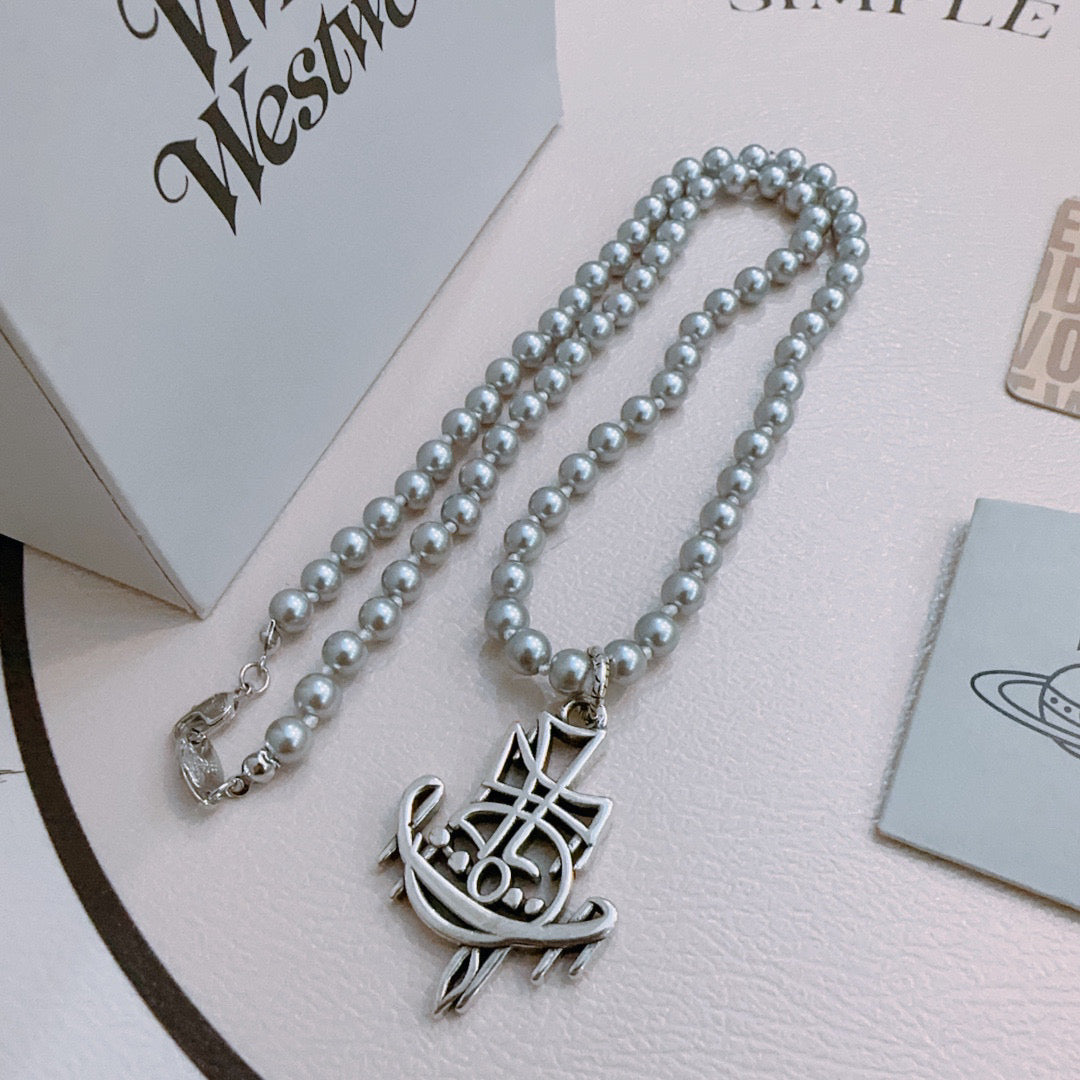 New Fashion Trends  Queen of Saturn 🪐✨  High quality classic Saturn pearl necklace, suitable for both men and women