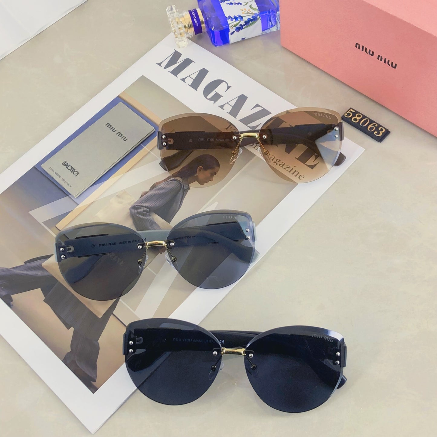 New fashion trend miu frameless cut edge sunglasses for women, high-end sunglasses for celebrities, same style large frame street photography UV resistant sunglasses
