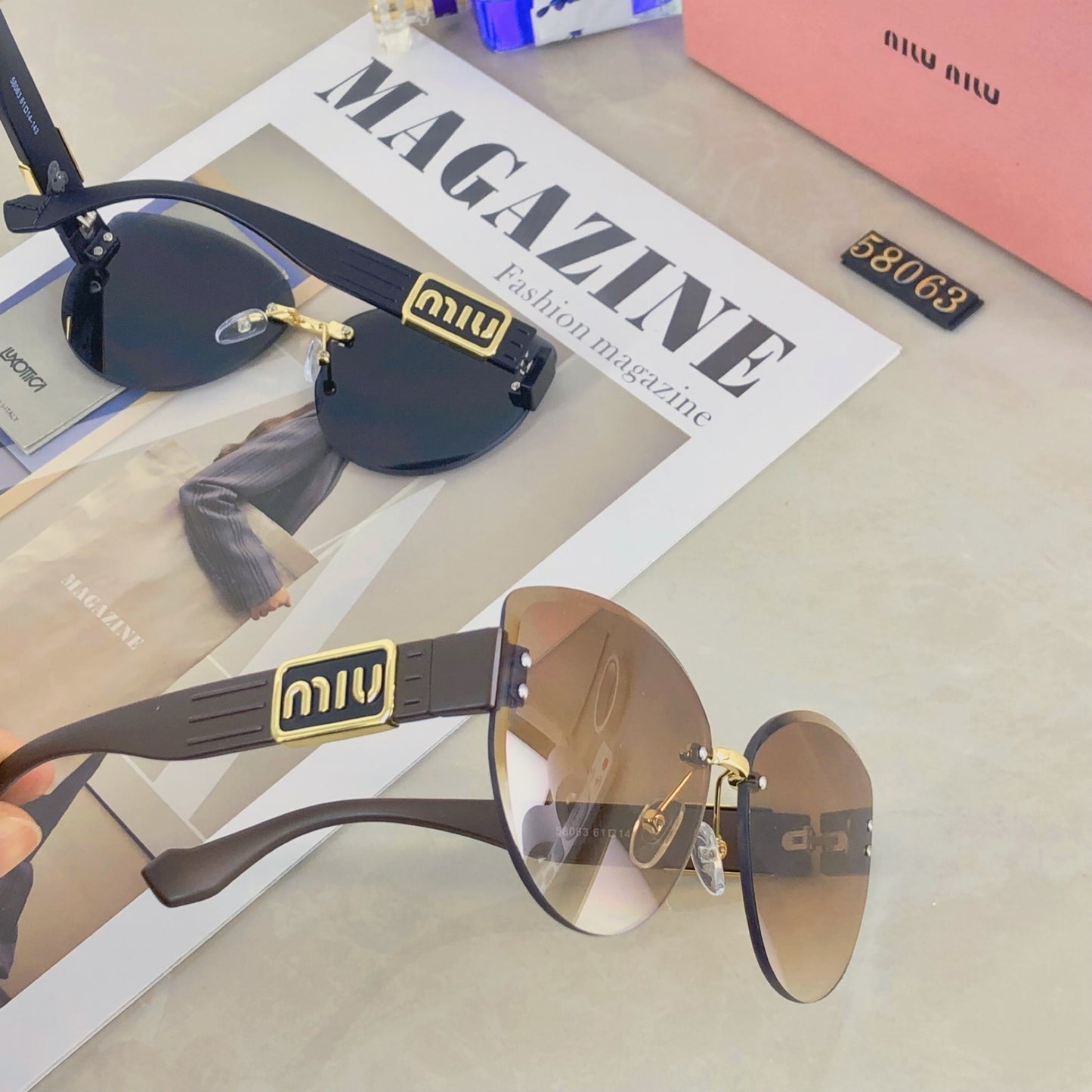 New fashion trend miu frameless cut edge sunglasses for women, high-end sunglasses for celebrities, same style large frame street photography UV resistant sunglasses