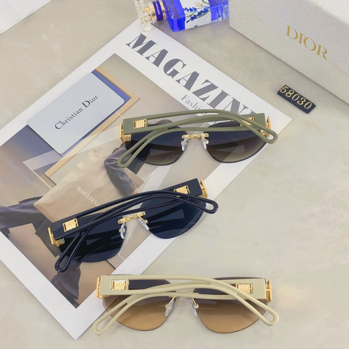 New fashion, personality, avant-garde, European and American women's UV resistant cat eyes frameless color blocked legs, wide leg sunglasses, sunglasses