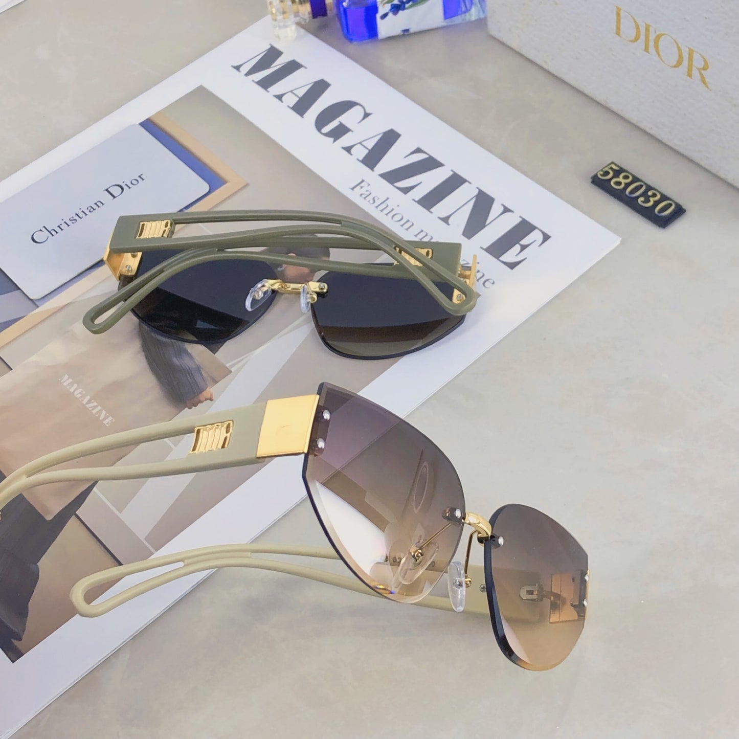 New fashion, personality, avant-garde, European and American women's UV resistant cat eyes frameless color blocked legs, wide leg sunglasses, sunglasses